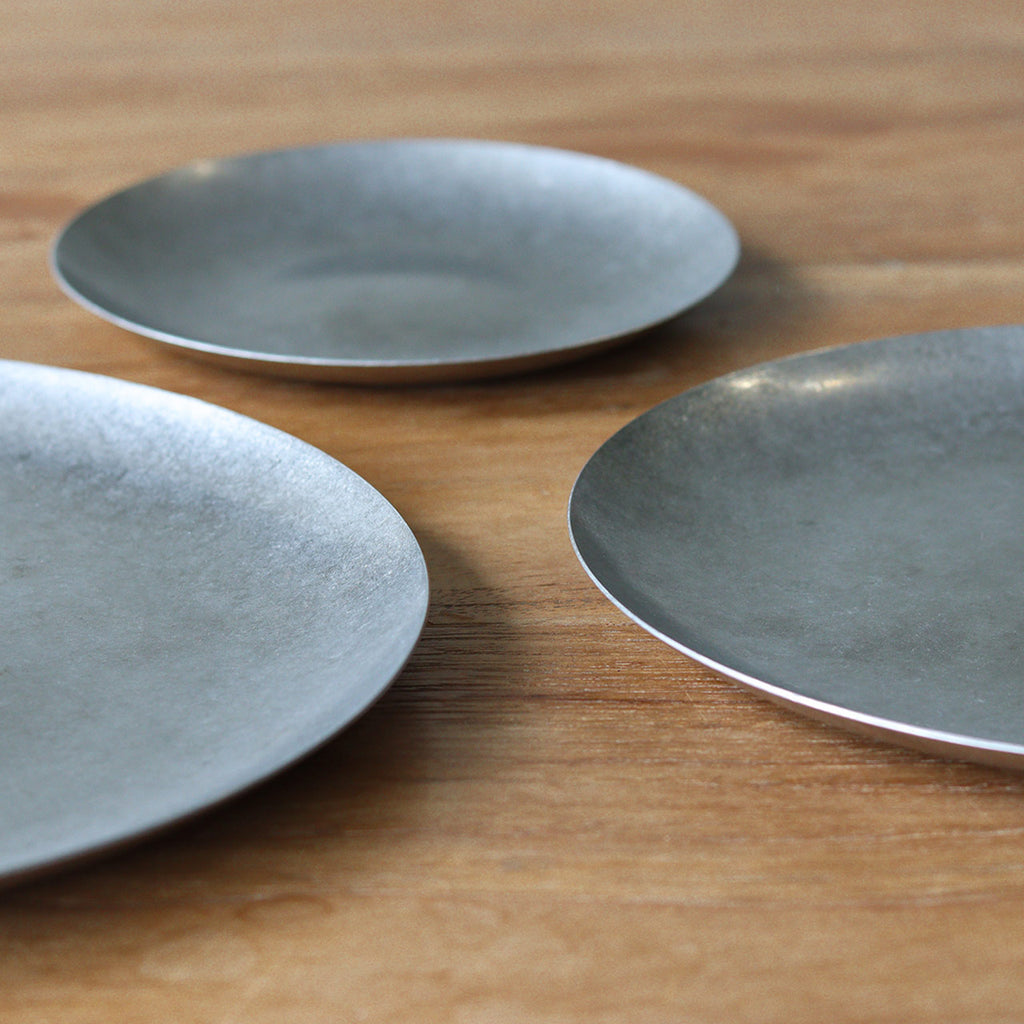 Assiette en inox 23cm diam.